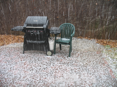 Our brick patio covered in hail